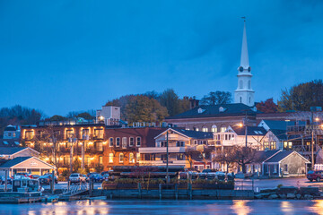 Fototapeta premium USA, Maine, Camden. Autumn in Camden Harbor at dusk.