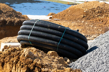 black plastic pipes for water supply and sewerage prepared for installation