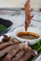 Grilled slice pork neck dipping spicy sauce