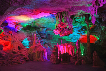 Karst cave with colorful light