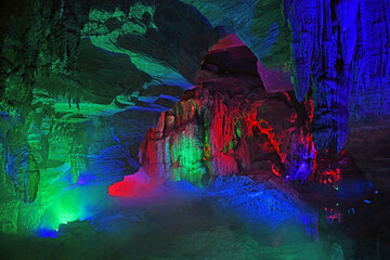 Karst cave with colorful light