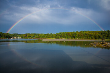 Fototapeta na wymiar USA, Massachusetts, Cape Ann, Gloucester. Circular rainbow over Goose Cove