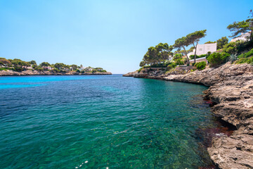 Fototapeta premium Cala d'Or lagoon on Mediterranean Mallorca island in Spain on a sunny day