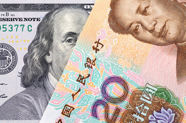 One hundred dollar notes and twenty yuan notes