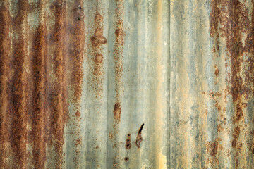 Old zinc vintage fence wall texture for background, pattern of rusty on metal panel.