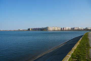 Lake Morii with blocks in the background, Bucharest, Romania.