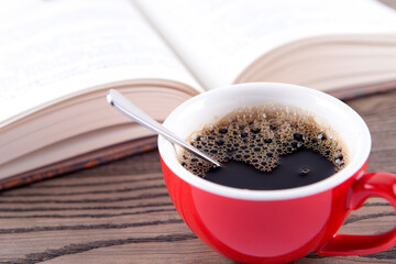 Reading, drinking coffee