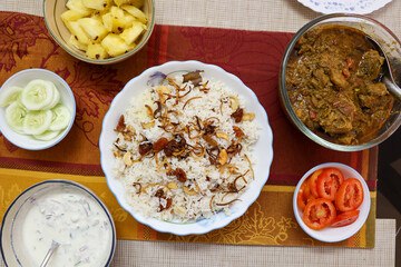 Chicken biryani Spicy Indian Malabar biryani Hyderabadi biryani, Dum Biriyani pulao Kerala India Sri Lanka Pakistan basmati rice mixed rice dish with meat curry Ramadan Kareem, Eid
