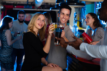 Friends meeting at nightclub party. High quality photo