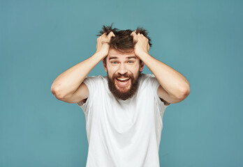 Emotional man gestures with his hands surprise shock model