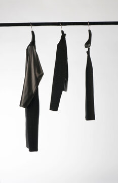 Elegant and trendy women's clothes hanging