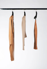 Elegant and trendy women's clothes hanging