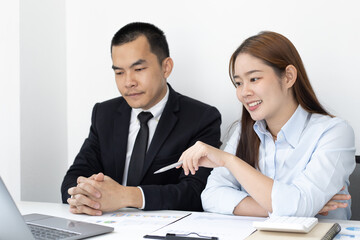 Brainstorm team, Marketers and financial accountants are discussing and analyzing charts to plan strategies to meet customer needs, Computer technology for business concept.