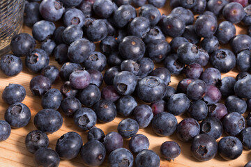 Juicy fresh blueberries on wooden table. High quality photo