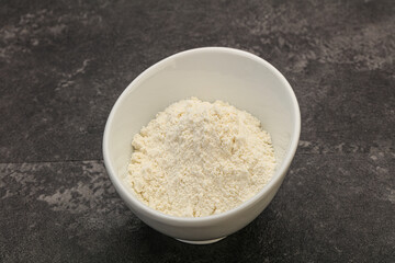 Wheat flour heap in the bowl