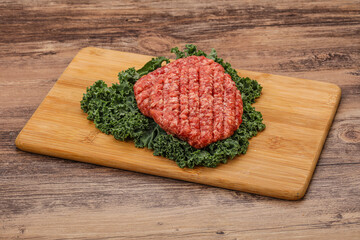 Raw beef burger cutlet for cooking