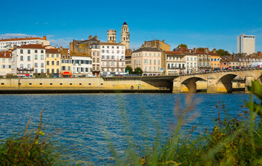 Fototapeta na wymiar Picturesque view of Macon town with Saone river, France