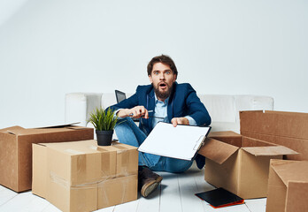 business man documents boxes unpacking professional office