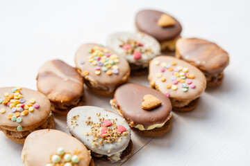 homemade easter spring chocolate egg cookies decorated with sprinkels 