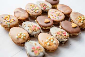 homemade easter spring chocolate egg cookies decorated with sprinkels 