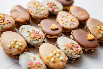homemade easter spring chocolate egg cookies decorated with sprinkels 
