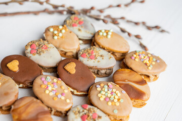 homemade easter spring chocolate egg cookies decorated with sprinkels 