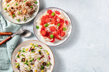 Konjac pasta dishes with various vegetables, overhead flat lay shot with copy space