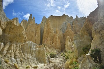 New Zealand, Clay Cliffs close to Omarama are made up of layers of gravel and silt. They were originally formed by the flow from ancient glaciers over a million years ago.