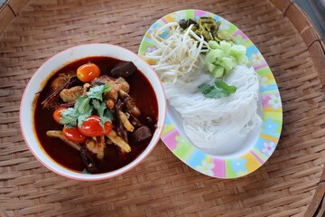 Kanom Jeen Nam Ngiao is a popular local food in the North. With pork and a variety of vegetables