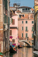 Fototapeta na wymiar canal with gondolas / Venice, Italy