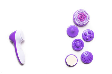 Electric isolate facial massager . Purple massager. Facial care. Cosmetology. Women's care . Article about the health of the face . . Copy space
