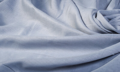 Fototapeta premium Gray wavy soft fabric. Abstract background
