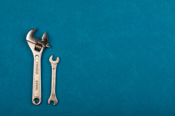 Set of tools on blue background as labour day background