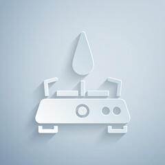 Paper cut Camping gas stove icon isolated on grey background. Portable gas burner. Hiking, camping equipment. Paper art style. Vector.