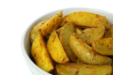 Bowl with baked potato wedges isolated on white background