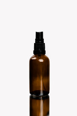 Face skin and body care concept, Healthy natural cosmetics in dark glass reusable bottles. Hyaluronic acid with pipette.