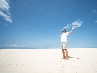 One man is enjoying beautiful tropical beach