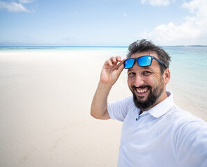 One man is enjoying beautiful tropical beach