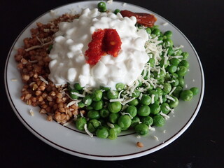 warm salad with buckwheat tnd green peas
