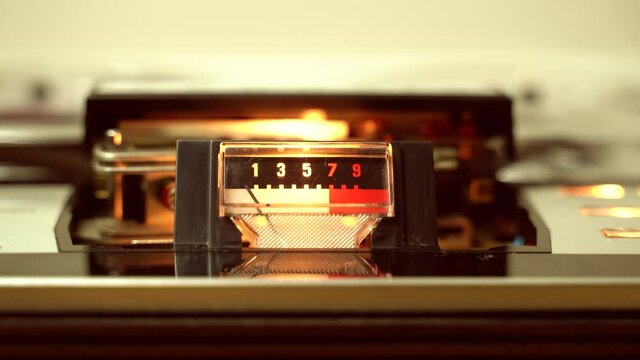 old reel to reel tape recorder. Audio level meter, close up shot