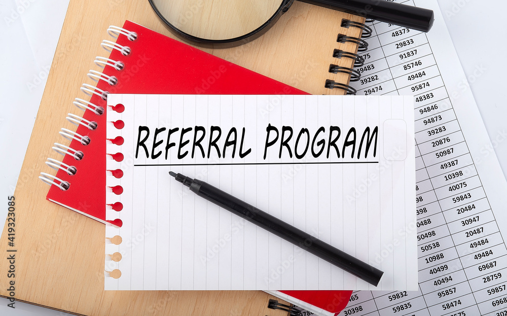 Aufkleber word writing text referral program . business concept on the table chart.