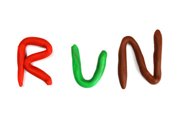 word runn from plasticine isolated on white