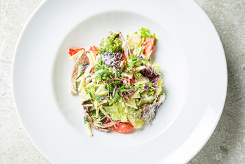 fresh salad with chicken and vegetables