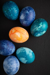 Easter eggs close up on black background