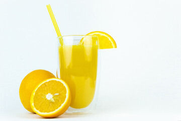 Glass of orange juice and fresh orange on white background. Fresh Orange Juice.