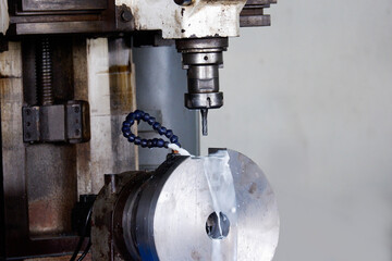 Professional tool technician A landscape of a man using a lathe. Metal industry concept