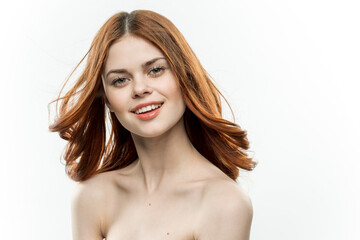 woman with bare shoulders attractive look loose hair smile