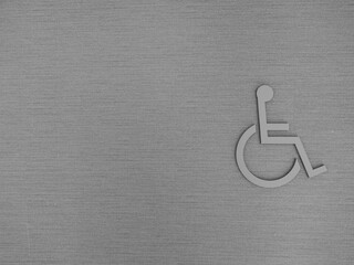車イスのアイコン。トイレなどへ誘導のためのシンボル。