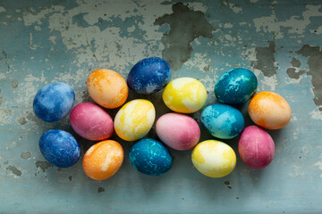 Easter eggs on blue old concrete background