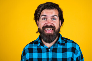 unshaven happy guy with lush and healthy beard, hair care